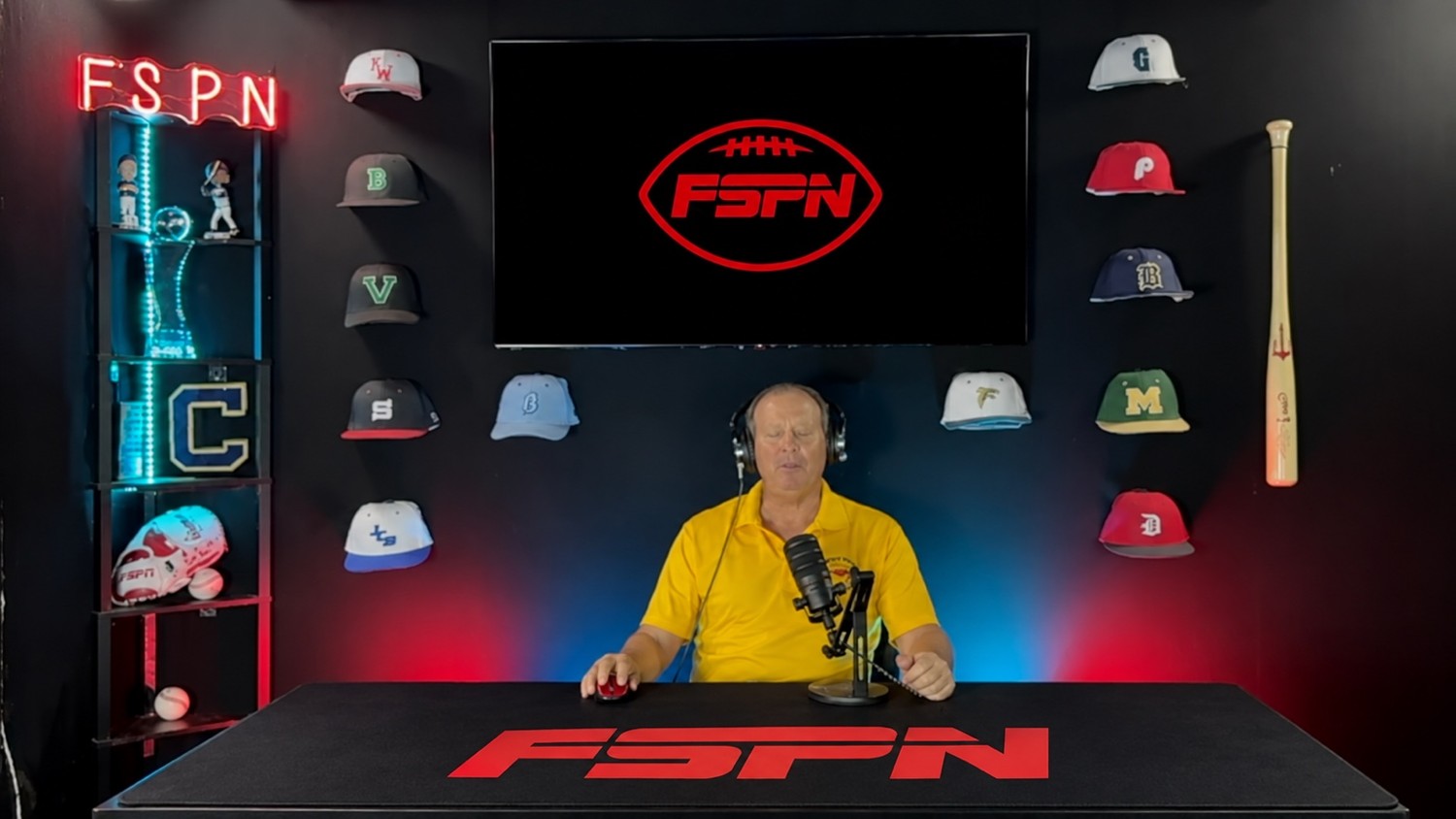 Uncle Mugs behind the microphone in the FSPN studio